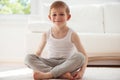 Happy little  boy exercising at home Royalty Free Stock Photo