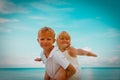 Happy little boy and girl play on beach Royalty Free Stock Photo