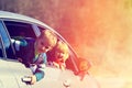 Happy little boy and girl travel by car in nature Royalty Free Stock Photo