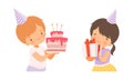 Happy Little Boy and Girl Wearing Cone Birthday Hat Holding Gift Box and Cake with Candles Cheering About Holiday Vector Royalty Free Stock Photo