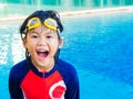Happy little boy has fun and enjoy in the swimming pool Royalty Free Stock Photo