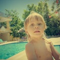 Boy near swimming pool Royalty Free Stock Photo