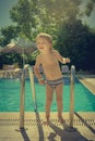 Boy near swimming pool Royalty Free Stock Photo