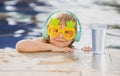 Happy little boy having fun in summer swimming pool. Family vacation. Royalty Free Stock Photo