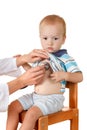 Happy little boy, health exam at doctor's office Royalty Free Stock Photo