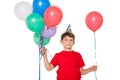 Happy little boy holding bunch of balloons Royalty Free Stock Photo