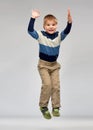 Happy little boy jumping in air Royalty Free Stock Photo