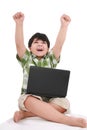 Happy little boy with laptop Royalty Free Stock Photo