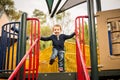 Happy little boy on the playground