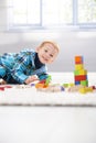 Happy little boy playing with cubes Royalty Free Stock Photo