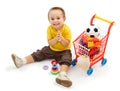 Happy little boy, playing with new toys Royalty Free Stock Photo