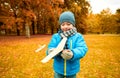 Happy little boy playing with toy plane outdoors Royalty Free Stock Photo