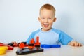 Happy little boy playing with toys Royalty Free Stock Photo