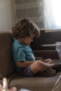 Happy little Boy Playing Video Games. Child using video game Controller. Kid with Joystick playing Computer Game.