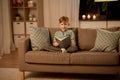 Happy little boy reading book at home Royalty Free Stock Photo