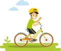 Happy little boy riding bikes isolated on white