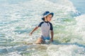 Happy little boy running on sand tropical beach Royalty Free Stock Photo