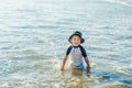 Happy little boy running on sand tropical beach Royalty Free Stock Photo