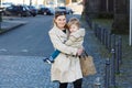 Happy little boy sitting on mum's arms Royalty Free Stock Photo