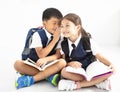 Little Boy whispering to the girl Royalty Free Stock Photo