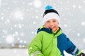 Happy little boy in winter clothes outdoors Royalty Free Stock Photo