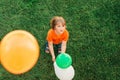 Happy little boy of 4-5 years old playing with colorful balloons Royalty Free Stock Photo