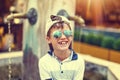 Happy little caucasian boy in cap laughing outdoorat summer Royalty Free Stock Photo