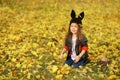 Happy little child, baby girl laughing and playing in the autumn on the nature walk outdoors. Royalty Free Stock Photo