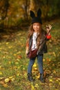 happy little child, baby girl laughing and playing in the autumn on the nature walk outdoors. Royalty Free Stock Photo