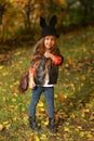 Happy little child, baby girl laughing and playing in the autumn on the nature walk outdoors. Royalty Free Stock Photo