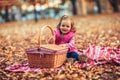 Little child, baby girl laughing and playing in the autumn park Royalty Free Stock Photo