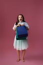happy little child girl holds many shopping bags Royalty Free Stock Photo