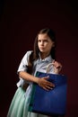 happy little child girl holds many shopping bags Royalty Free Stock Photo