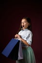 happy little child girl holds many shopping bags Royalty Free Stock Photo