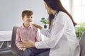 Happy little child patient having fun during his visit to the pediatrician at the clinic Royalty Free Stock Photo