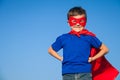 Happy little child playing superhero. Royalty Free Stock Photo