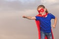 Happy little child playing superhero. Royalty Free Stock Photo