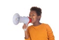 Happy little child speaking with a megaphone