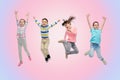 Happy little children jumping in air Royalty Free Stock Photo