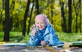 Happy little girl in an autumn park Royalty Free Stock Photo