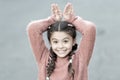 Happy little girl in autumn sweater. Small child with long hair. Casually beautiful. Happy childhood. Autumn snuggles