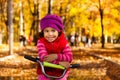 Happy little girl on bicycle Royalty Free Stock Photo