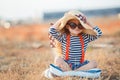 The happy little girl in a big hat Royalty Free Stock Photo