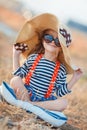 The happy little girl in a big hat Royalty Free Stock Photo