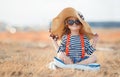 The happy little girl in a big hat Royalty Free Stock Photo