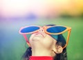 Happy little girl with big sunglasses Royalty Free Stock Photo
