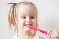 Happy Little Girl Brushing Her Teeth, Pink Toothbrush, Dental Hygiene Morning Night