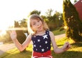 Happy little girl celebrating Independence Day