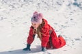 Happy little girl child playing on snow day. Christmas and Happy new year. Smiling kid on winter walk in nature. Royalty Free Stock Photo