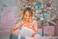 Happy little girl at Christmas eve Royalty Free Stock Photo